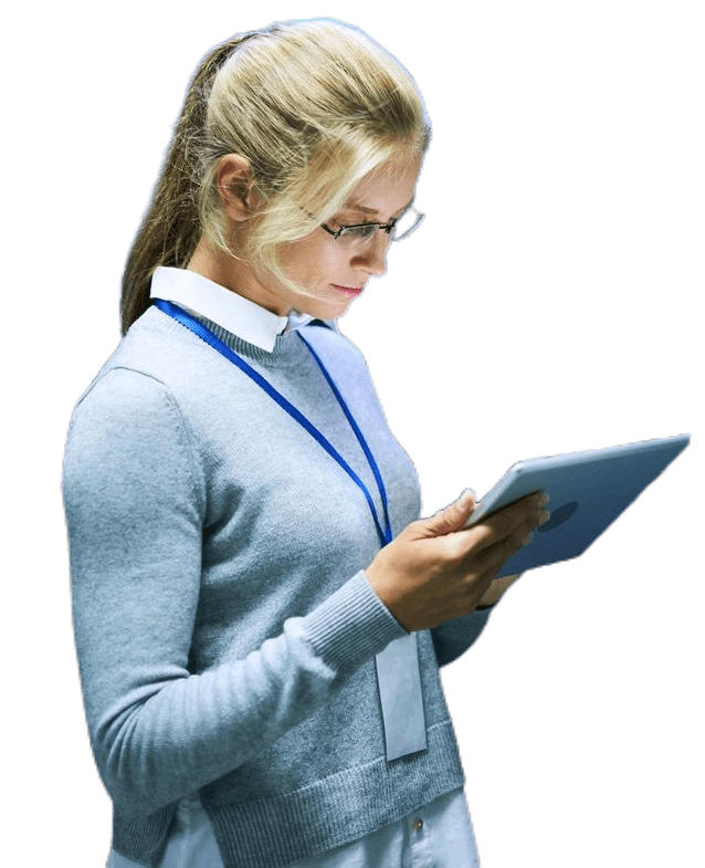 A woman is holding an ipad and looking at it.